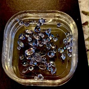 Collection of small tanzanite stones.